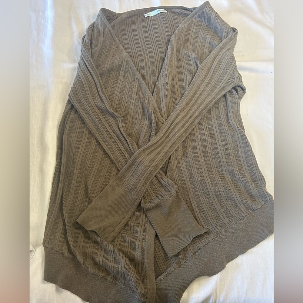 Maurice’s brown cardigan